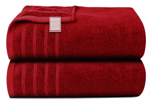 High absorbency bath sheet towels hanging by a shower